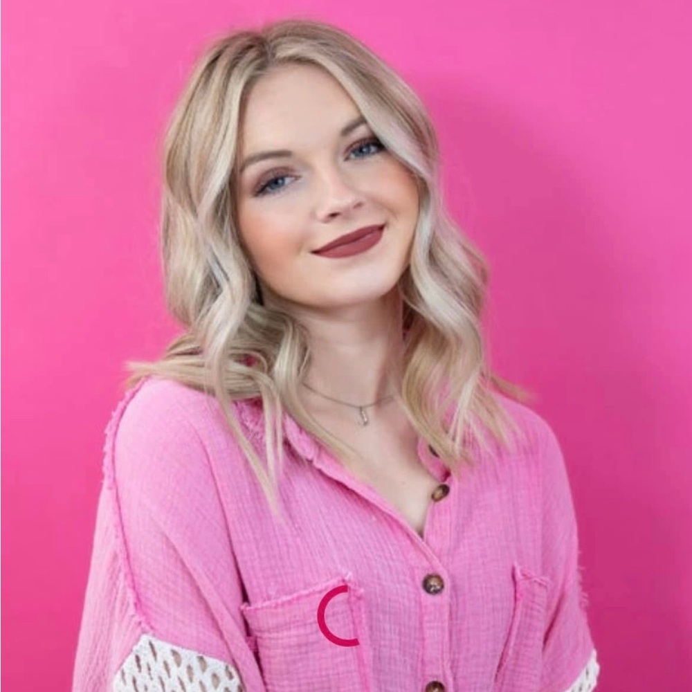 Long sleeve button top with crocheted sleeves.
NWOT